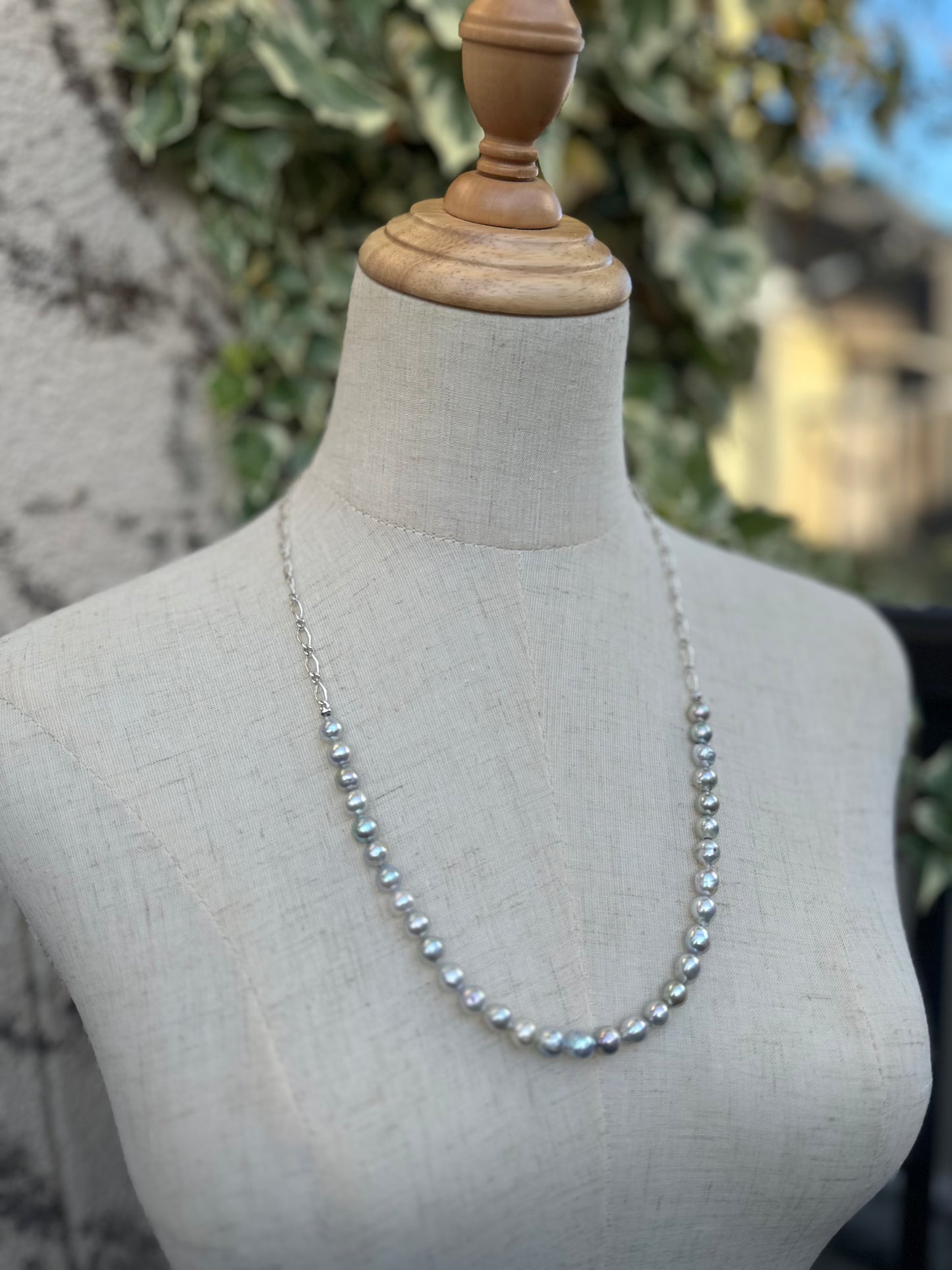 Silver blue Akoya pearl and silver charm necklace