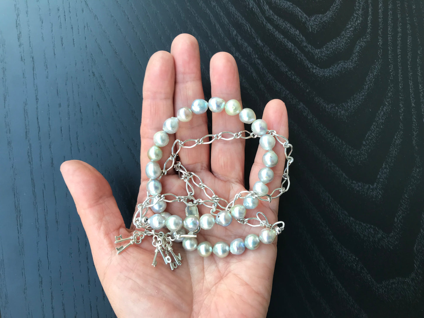 Silver blue Akoya pearl and silver charm necklace