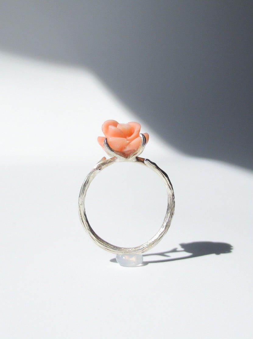 Carved angel skin coral rose ring with silver thorns