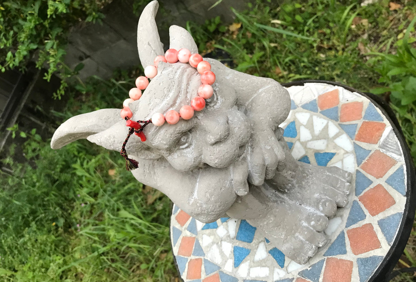 Large coral beads and silk Kumihimo bracelet