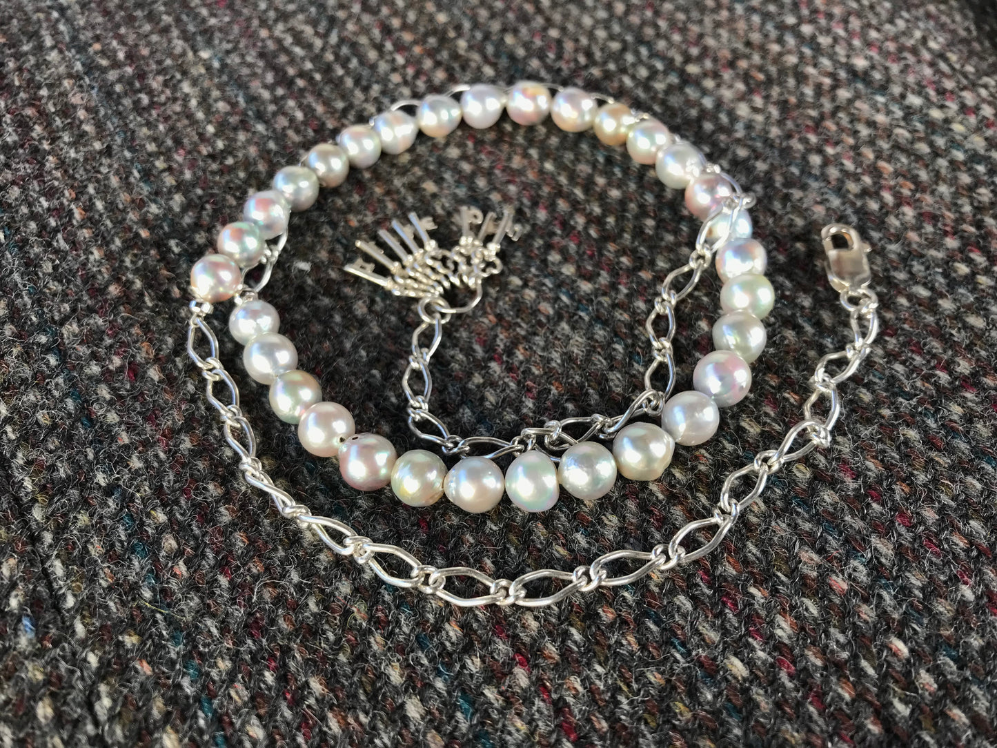 Silver blue Akoya pearl and silver charm necklace