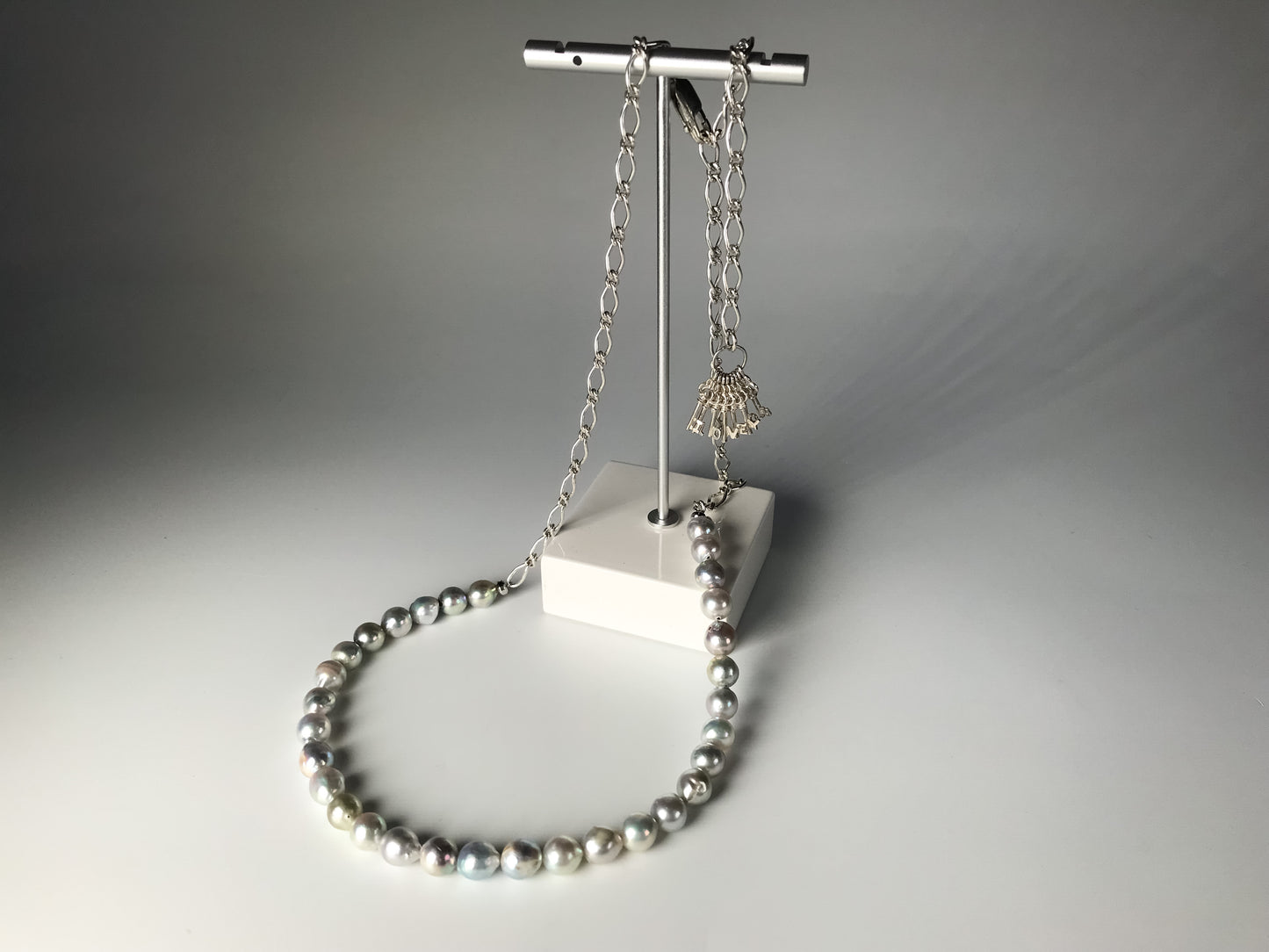 Silver blue Akoya pearl and silver charm necklace