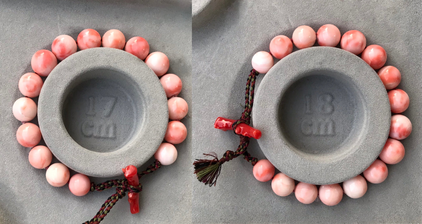 Large coral beads and silk Kumihimo bracelet
