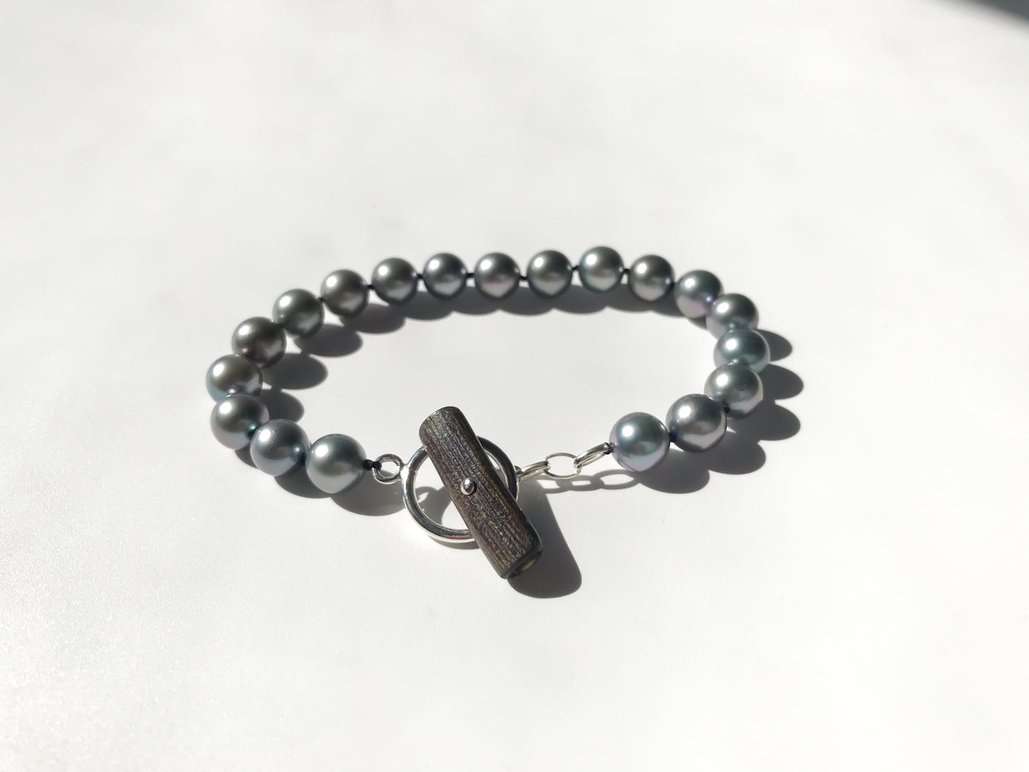 Silver blue Akoya pearl bracelet silver 925 toggle ring with deep sea coral bar