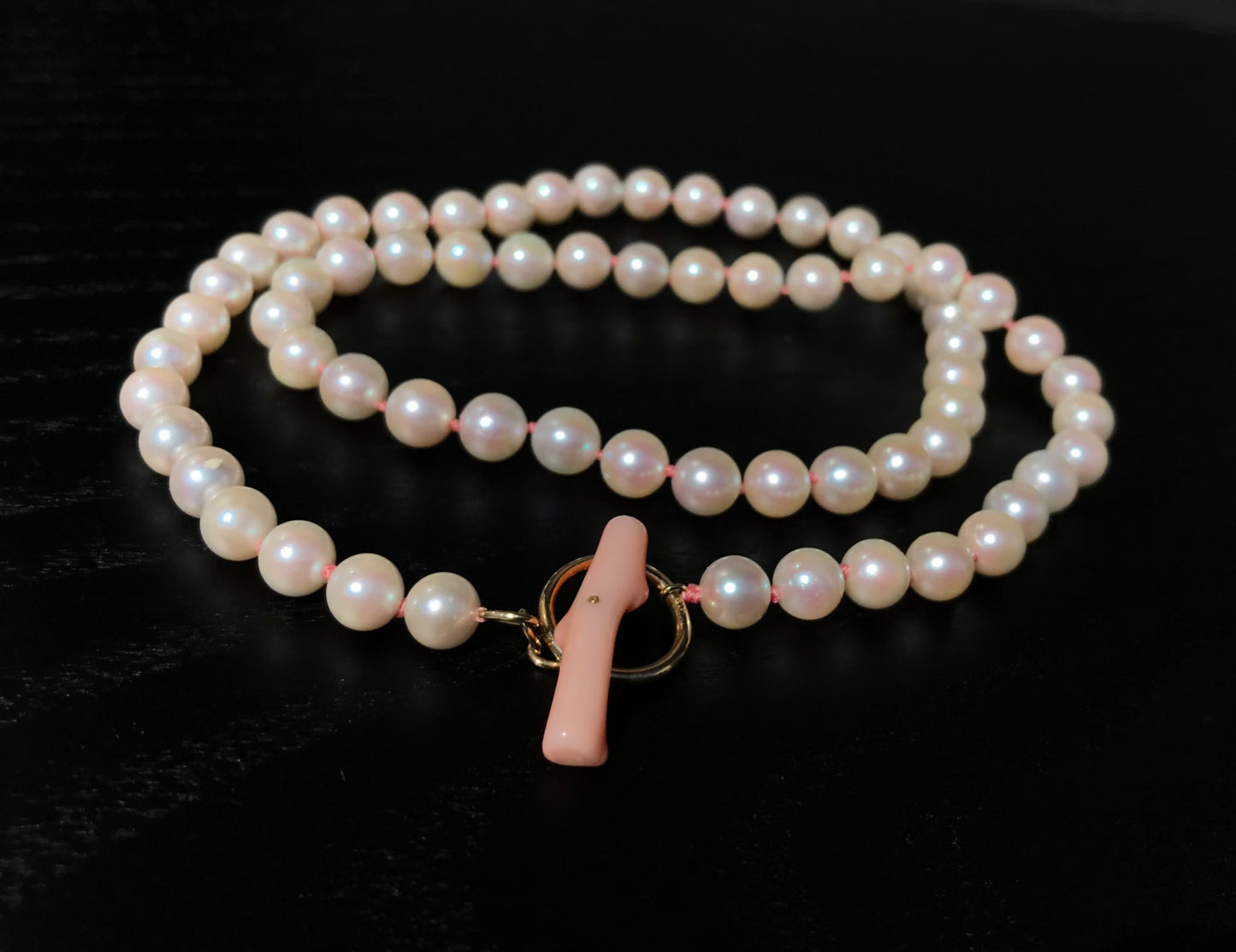 K18 Akoya pearl necklace with pink deep sea coral bar