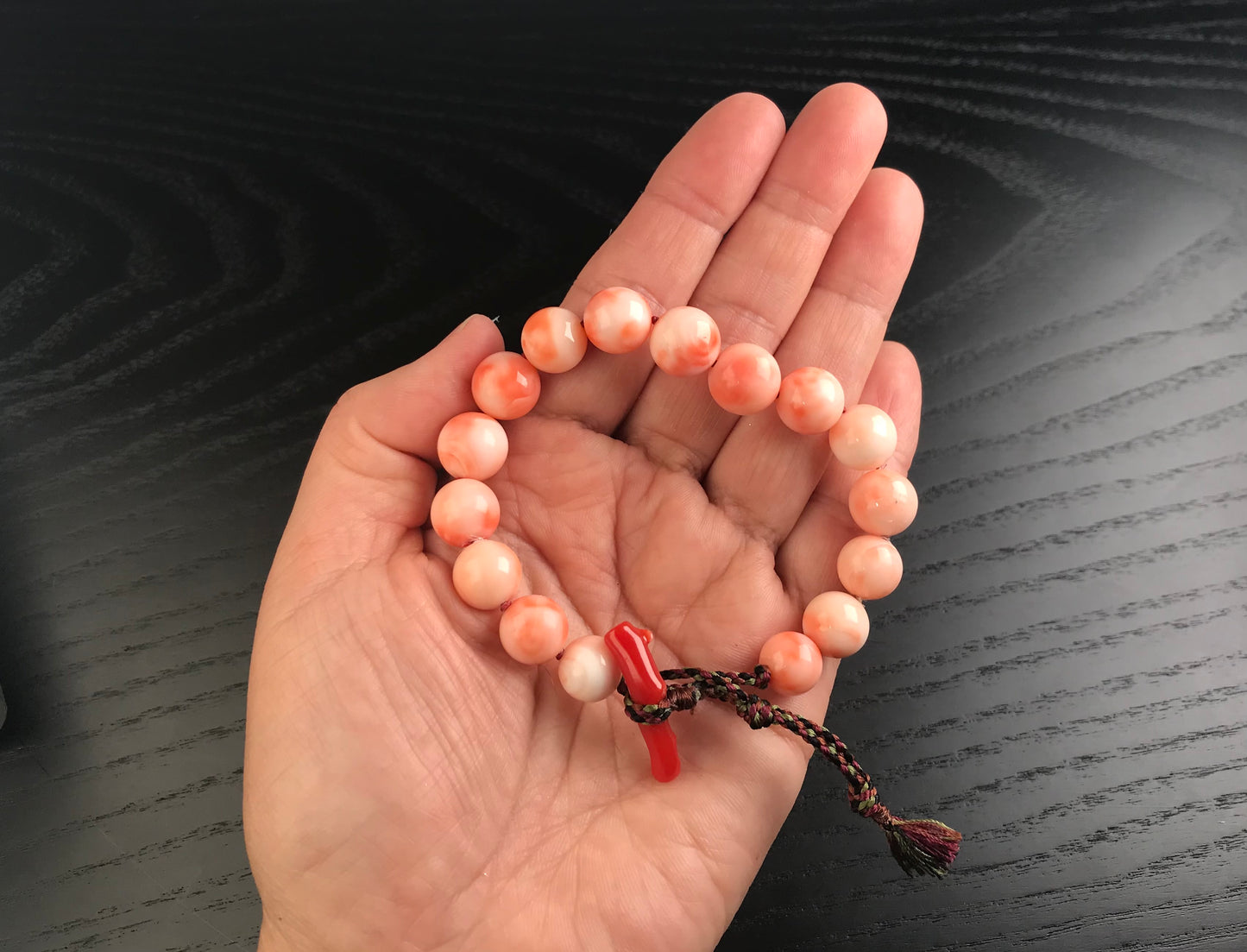 Large coral beads and silk Kumihimo bracelet