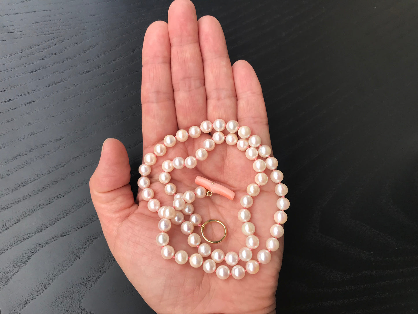 K18 Akoya pearl necklace with pink deep sea coral bar