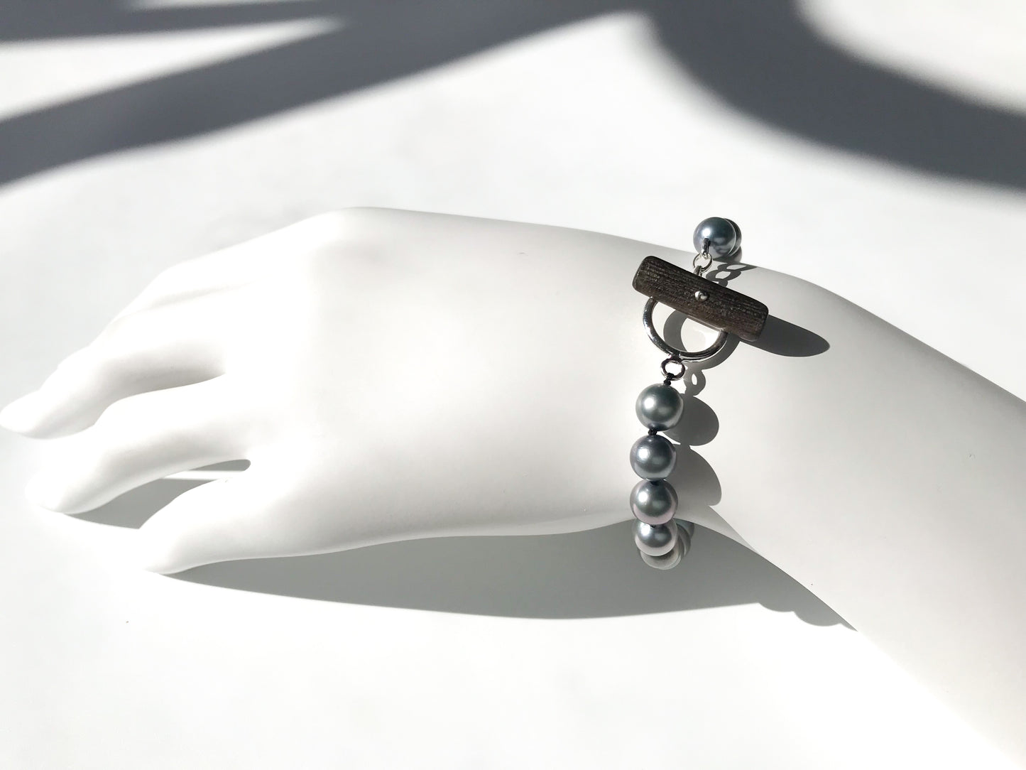 Silver blue Akoya pearl bracelet silver 925 toggle ring with deep sea coral bar